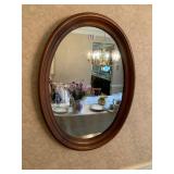 OVAL WALL MIRROR, WOOD FRAME, STAINED FINISH.