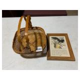 WOVEN BAMBOO BASKET, CARVED ANIMAL HEAD HANDLES,