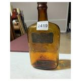 AMBER GLASS WHISKEY BOTTLE, EMBOSSED WHEAT AND