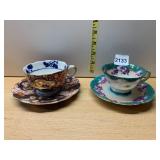 HAND-PAINTED PORCELAIN TEA CUPS, SAUCERS, FLORAL