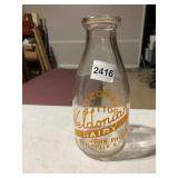 WELDONIAN DAIRY MILK BOTTLE, CLEAR GLASS, ORANGE