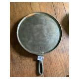 CAST IRON GRIDDLE, MARKED 999A, ROUND, INTEGRATED