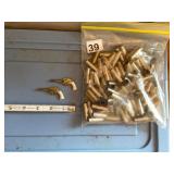 PAIR OF MINIATURE GOLD-TONE REVOLVER FIGURINES W/