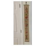 EMBROIDERED FLORAL WALL HANGING, BRASS FINIALS,