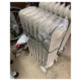 OIL-FILLED RADIATOR HEATER, WHITE, PORTABLE, ON