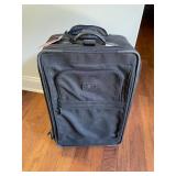 TUMI BLACK BALLISTIC NYLON ROLLING SUITCASE,