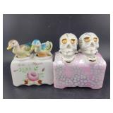 2 SALT AND PEPPER SETS: DUCKS AND SKULLS