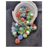 JAR OF ASSORTED GLASS MARBLES - COUNT UNKNOWN