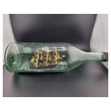 12" GREEN GLASS BOTTLE WITH MODEL SHIP INSIDE