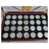 SET OF CHINESE SILVER 1 OZ COINS IN DISPLAY BOX -