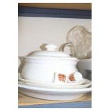 SHELF OF HOUSEHOLD DISHWARE