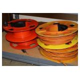 (2) EXTENSION CORDS (2) EXTRA REELS
