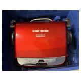 GEORGE FOREMAN GRILL WITH PLASTIC ROLLING STORAGE