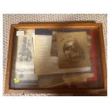 DISPLAY CASE W/ VARIOUS PIECES OF PAPER