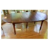 WALNUT DINING TABLE W/ 2 12in LEAVES