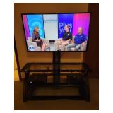 48" SAMSUNG FLAT SCREEN TV ON CONTEMPORARY....