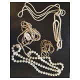 5 STRANDS OF FAUX PEARLS