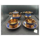 COPPER LUSTER TEAPOT, CREAMER, & 2 CUPS & SAUCERS