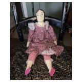 24" COMPOSITE HEAD, CLOTH BODY DOLL W/PURPLE DRESS