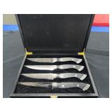 SET OF 4 LONGHORN STEAK HOUSE STEAK KNIVES