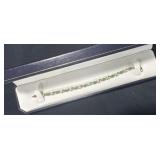 10K GOLD AND GREEN STONE BRACELET - 7"