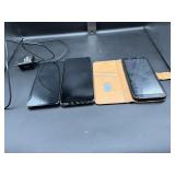 Three. Cell phones, Samsung, a cricket untested