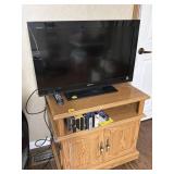 SONY BRAVIA 31" TV & TV STAND W/ VHS TAPES