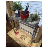 Metal plant stand and three floral pots