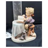 Goebel Hummel figurine titled "Little Bookkeeper"