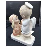 Jesus Is Born" Precious Moments figurine, which