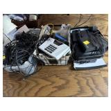 Three boxes of chargers, cables hard drives