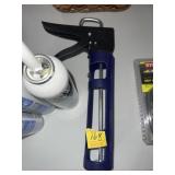 CAULK GUN & 3 TUBES OF CAULK