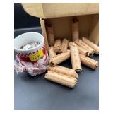 13  Rolls , a quarters and a cup of change.