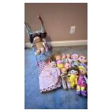 Collection of baby dolls and stroller