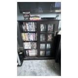 Top two rows of DVDs/BluRay & dvd player