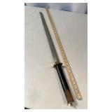 Military bayonet with steel blade and wooden grip