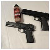 Two BB handguns with BBs