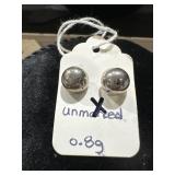 A pair of silver half sphere earrings studs