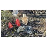 A collection of 3 garden statues