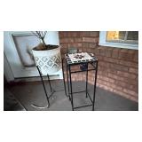 A planter and a tile side table