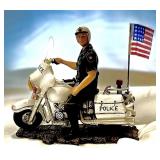 Police officer on motorcycle figurine