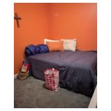 Full-size bed and contents of room