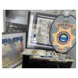 Local police department signs and memorabilia