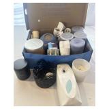 Collection of air fresheners and candles