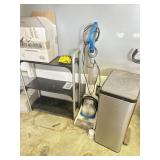 Trash can, Hoover floor cleaner, shelf, bottles