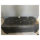 Leather bench with interior storage space w linens