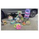 .interactive baby toys and a stroller
