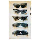Collection of sunglasses and readers