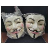 (2) GUY FAWKES CERAMIC MASKS AND 1 PAIR GLOVES