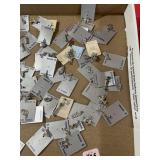 BOX OF STERLING SILVER CHARMS